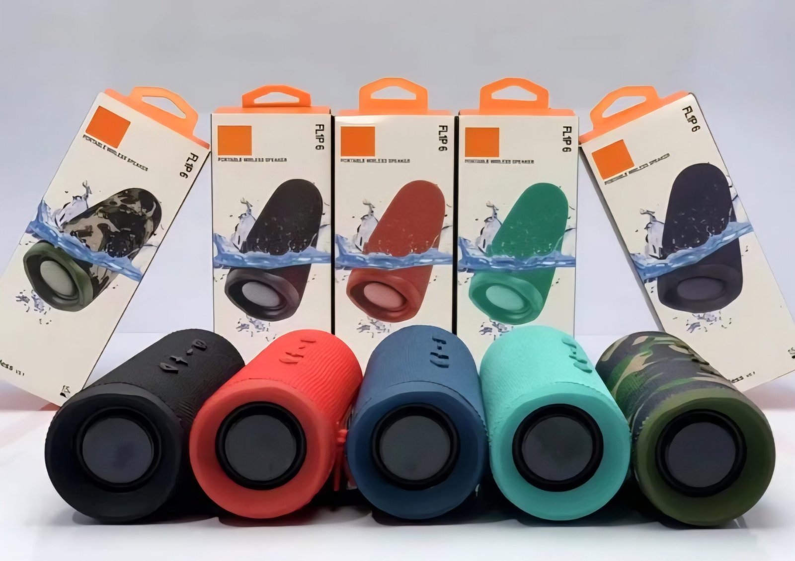 The photo-promptu speaker is JBL Flip 6, a portable, waterproof and dust-proof speaker. Key Features: Featuring a two-way speaker system that provides a clear and strong voice with a deep bass sound, as well as double negative radiators to enhance bass sound. - Image 2